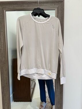Two long sleeved mesh tops